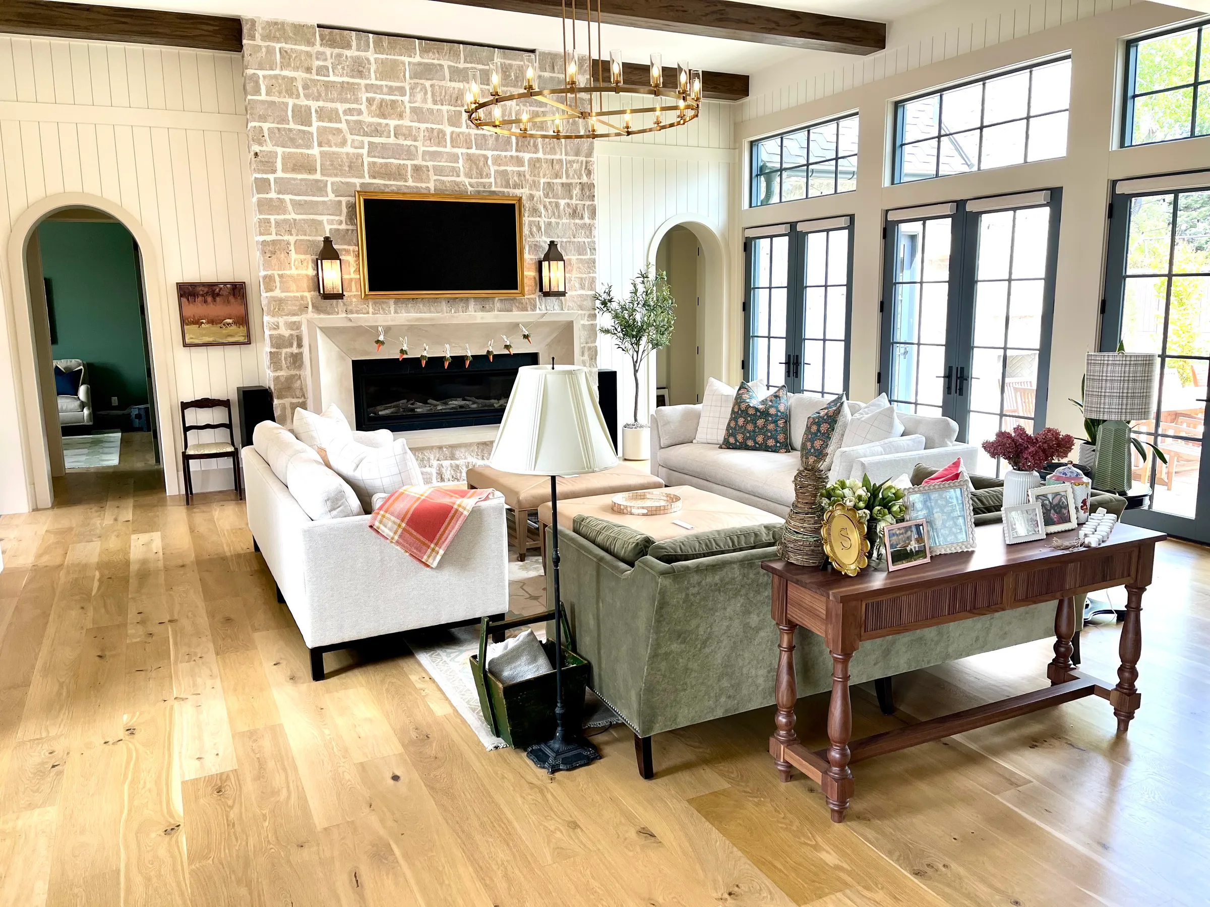 Newly installed light oak wood flooring with plank layout in residential interior space