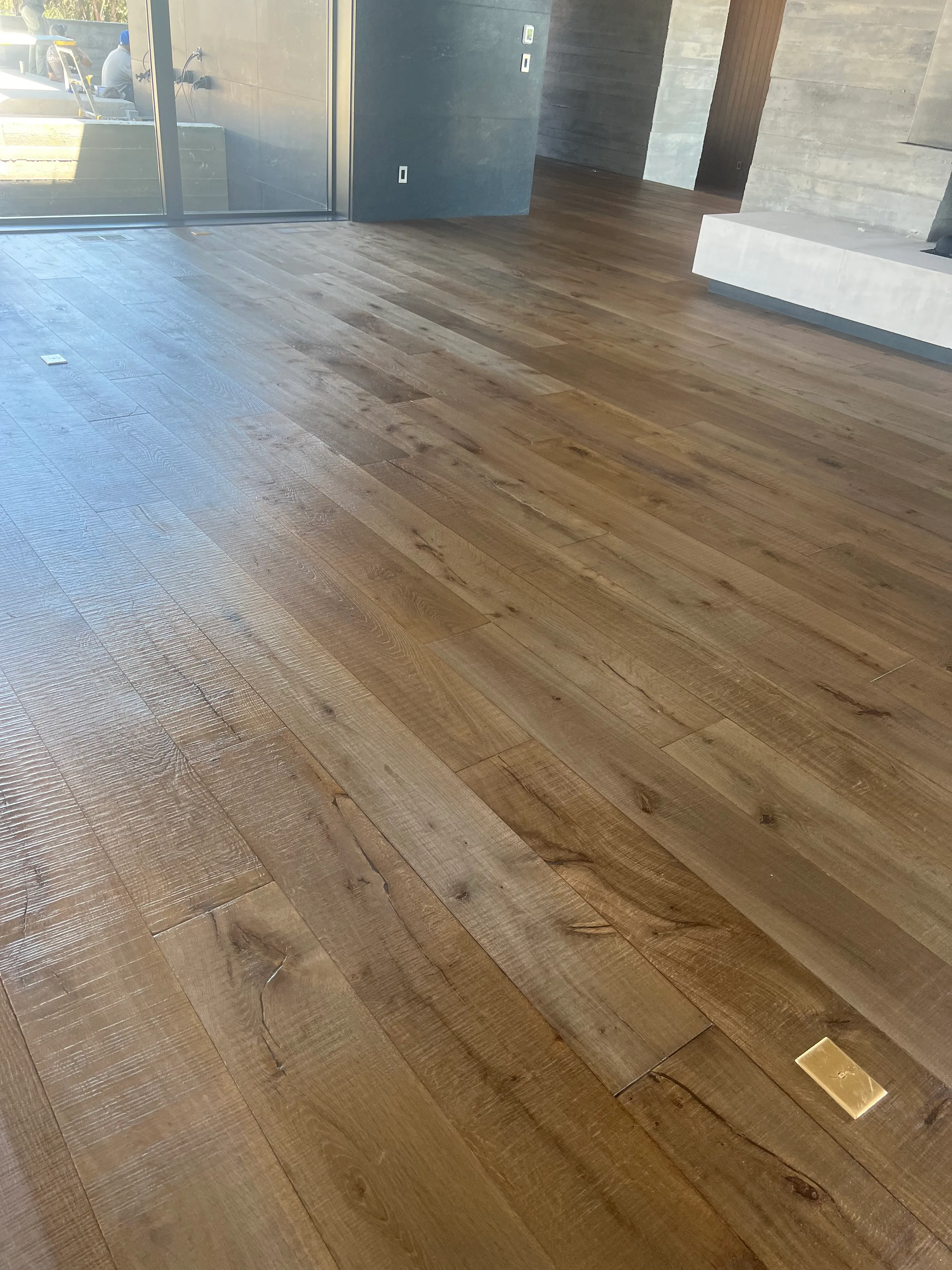 Pre-finished white oak flooring with factory finish in modern residential interior space