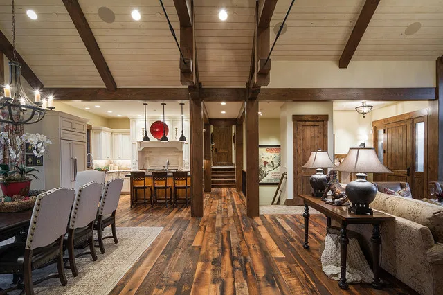 Newly installed reclaimed oak flooring with rich mixed tones and grain character in bright open living space